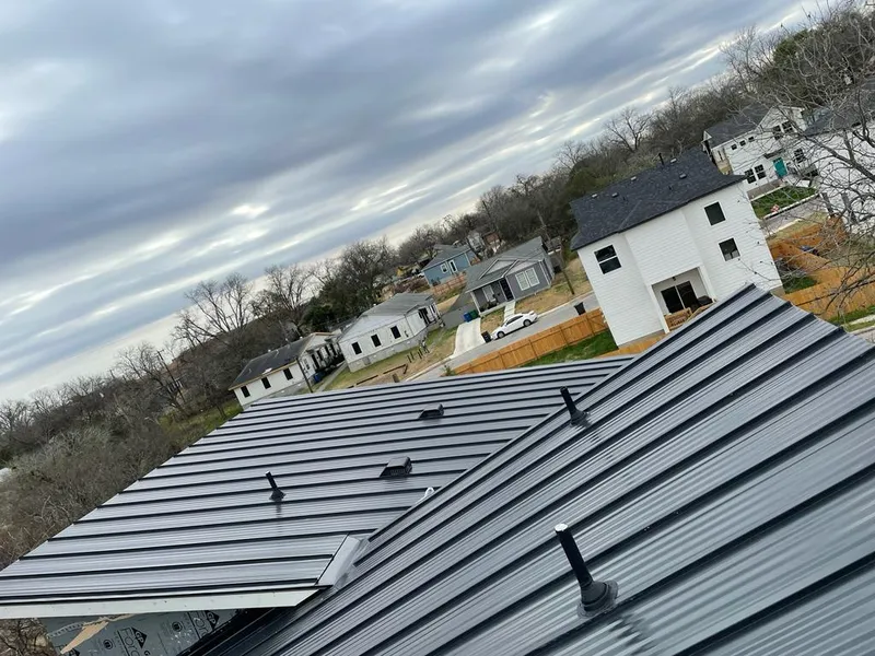 Standing seam metal roof panels with vents for Skylight Repair in Chena Ridge